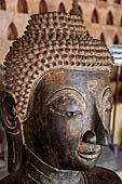 Vientiane, Laos - Wat Si Saket, The gallery around the sim houses thousands of Buddha statues in various mudras, dating  from the 16th century. 